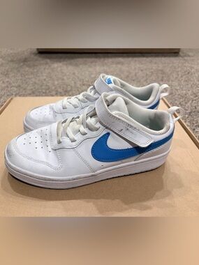 Nike Kids White Sneakers with Blue Swoosh and Hook Strap